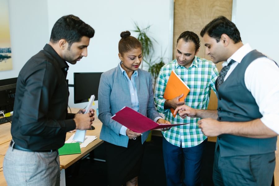Advisors reviewing client documents